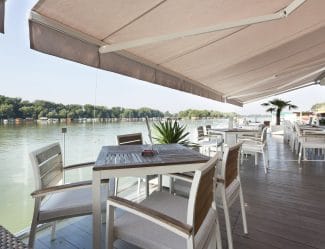 Modern riverside cafe terrace with white awning in Shoalhaven, NSW