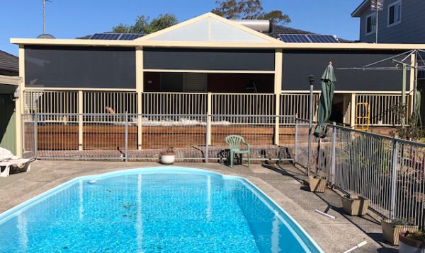 Outdoor zipscreen Awning by a pool- Albion Park Rail, NSW