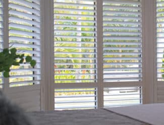 A white plantation shutter installed in a residence in Illawarra