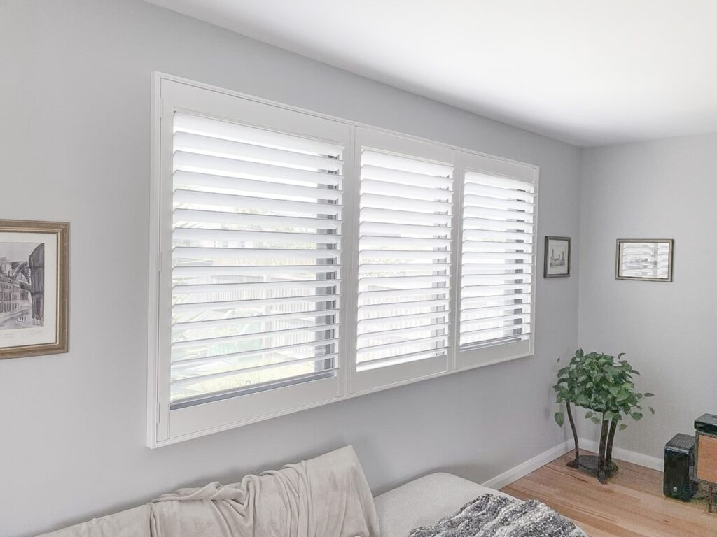 White plantation shutters in living room in Illawarra, Nsw