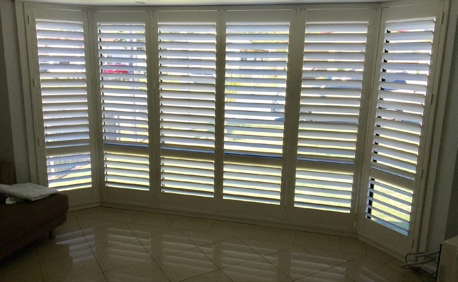 White plantation shutters in family room in Wollongong, NSW