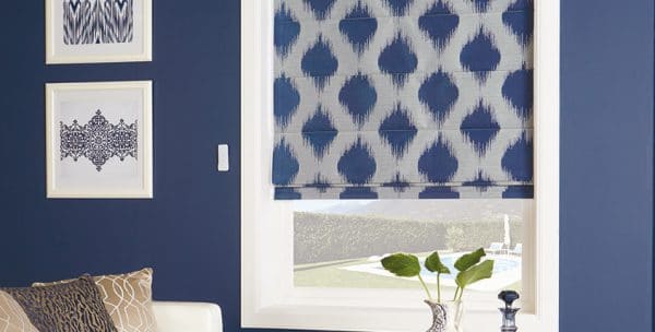 Blue and white patterned roman blinds in living room in Wollongong, NSW